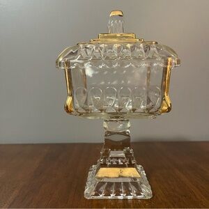 Mid-Century Modern gold-trimmed glass candy dish with a lid.